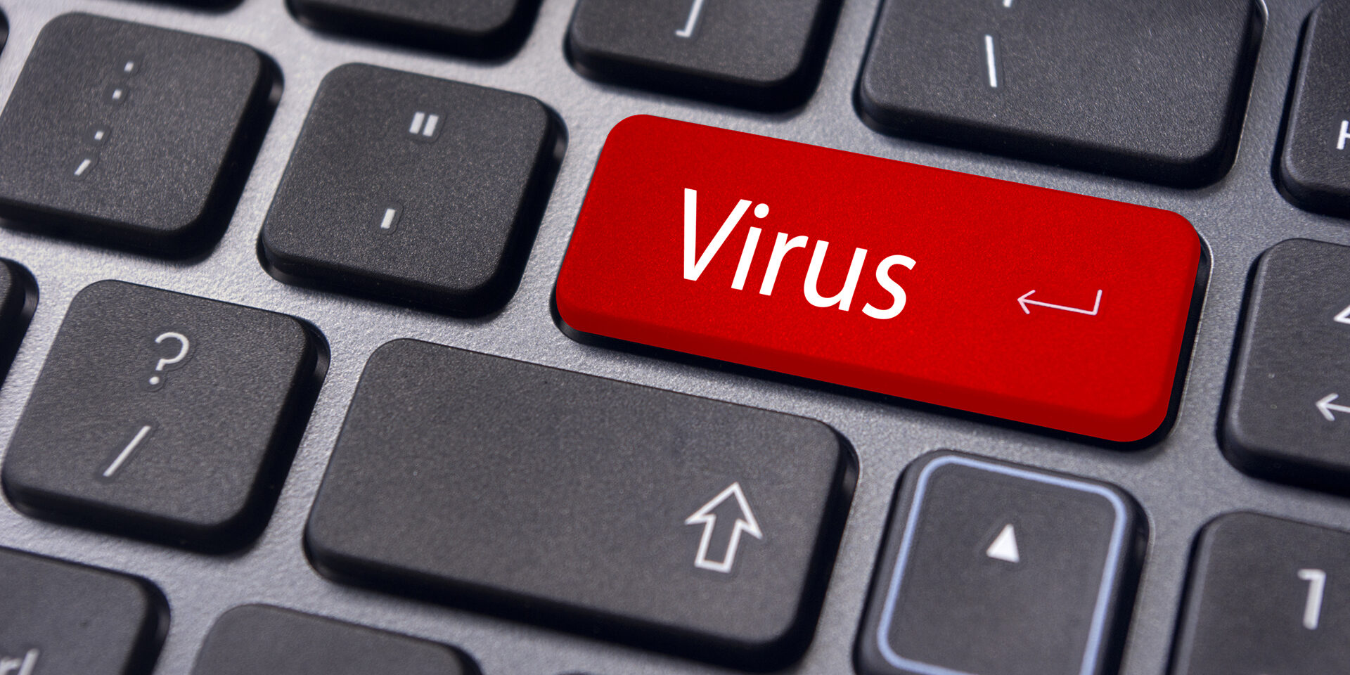 computer virus from internet, with message on enter key of keyboard.
